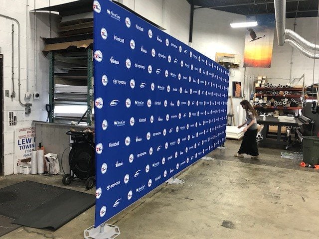 Step-and-repeat backdrop assembled in a production facility