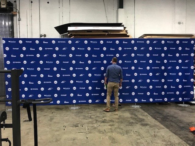 Step-and-repeat backdrop set up outdoors