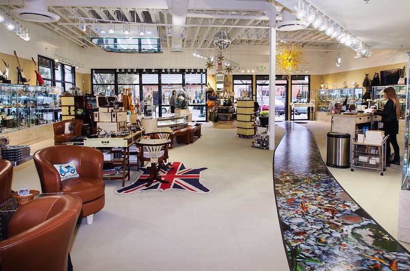 Printed floor graphic running through a retail store aisle