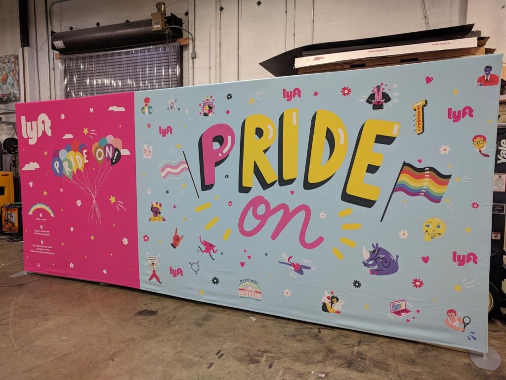 Large printed fabric graphic in a tension frame, 20ft by 8ft