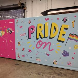 Large printed fabric graphic in a tension frame, 20ft by 8ft