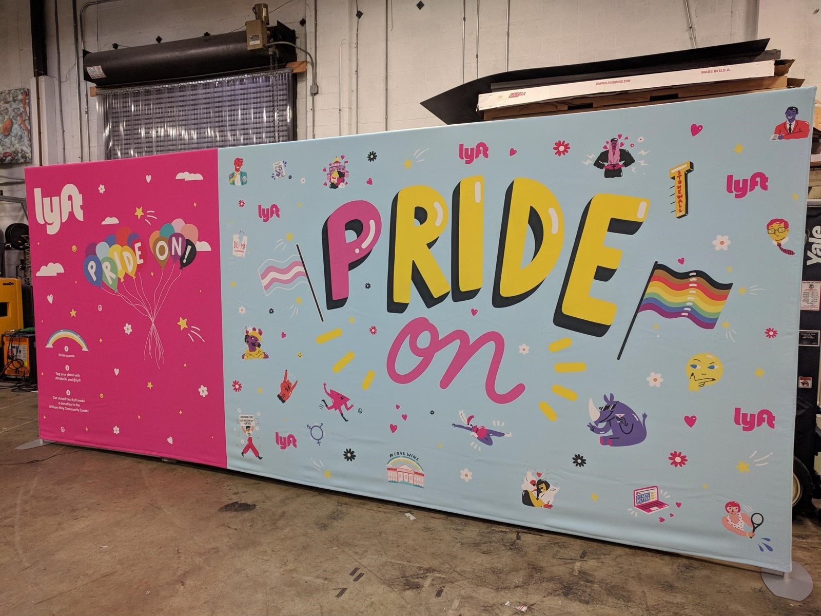 Large printed fabric graphic in a tension frame, 20ft by 8ft