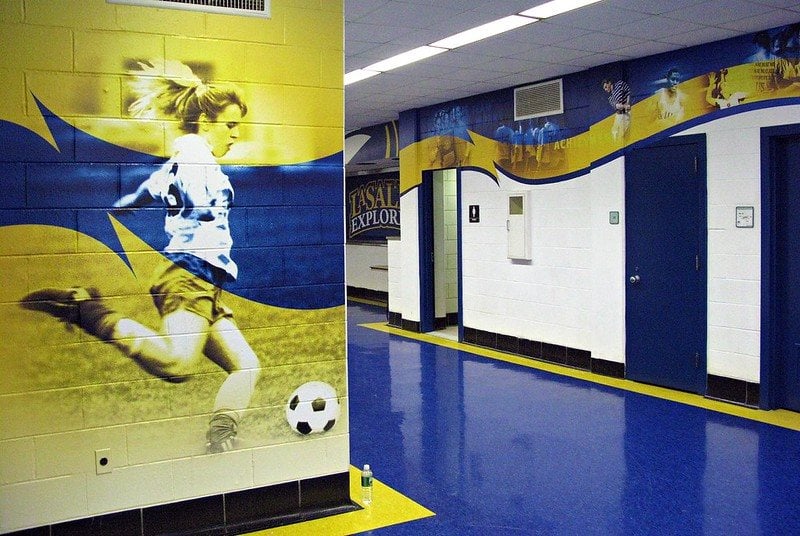 Printed wall mural applied to a school corridor wall